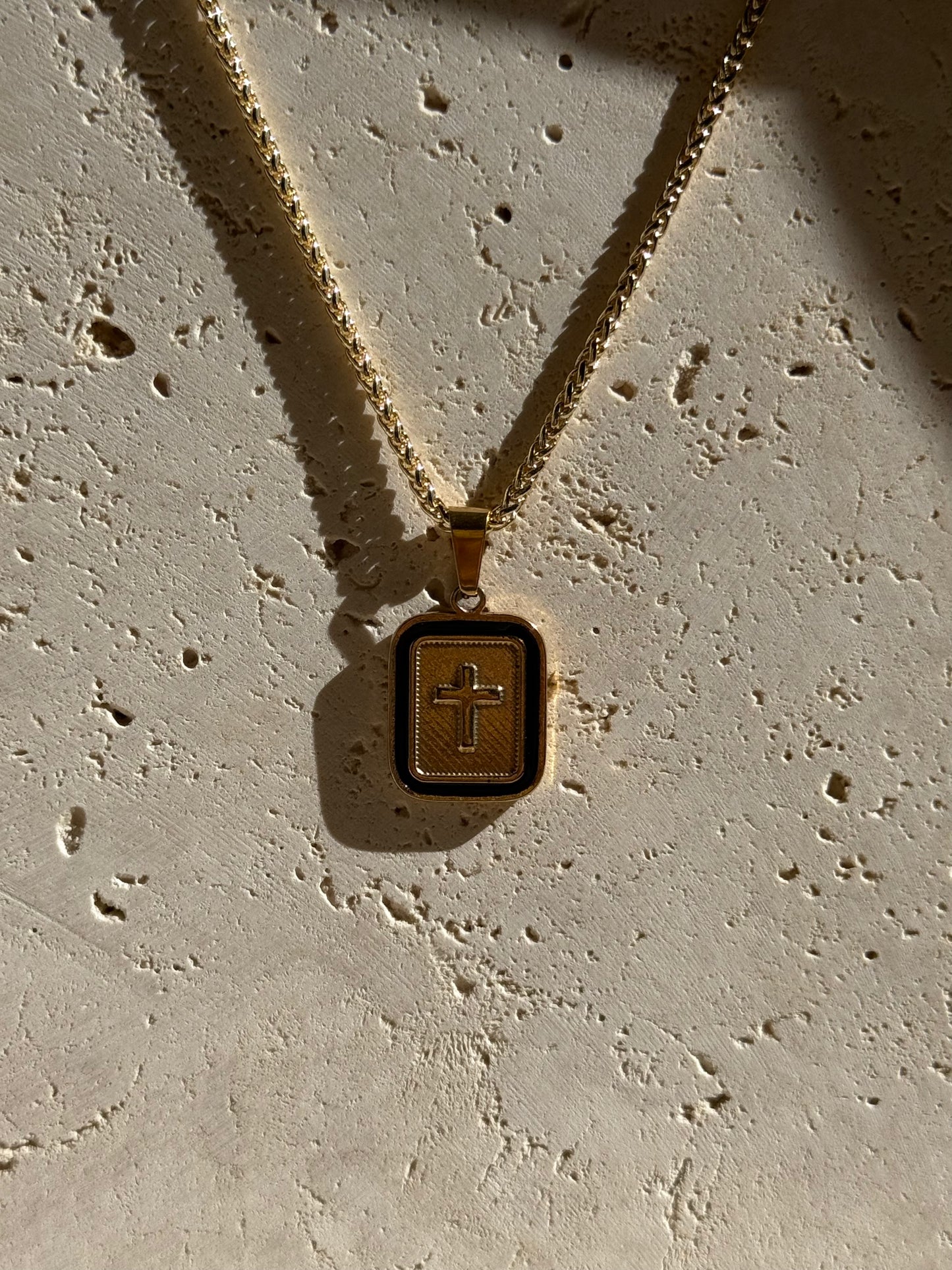 BLACK & GOLD FRAMED CROSS NECKLACE